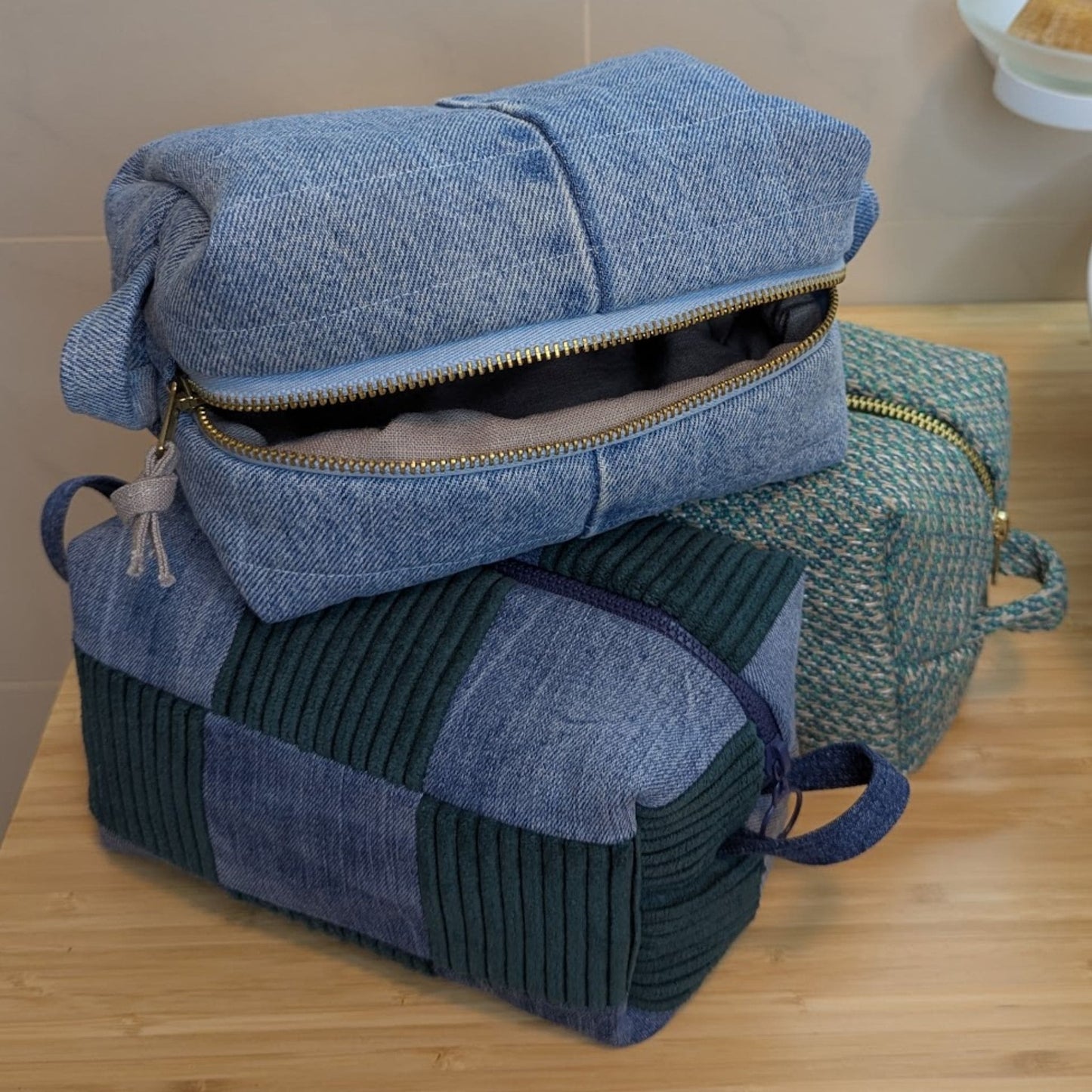 Large cosmetic bag made from upcycled jeans and textiles