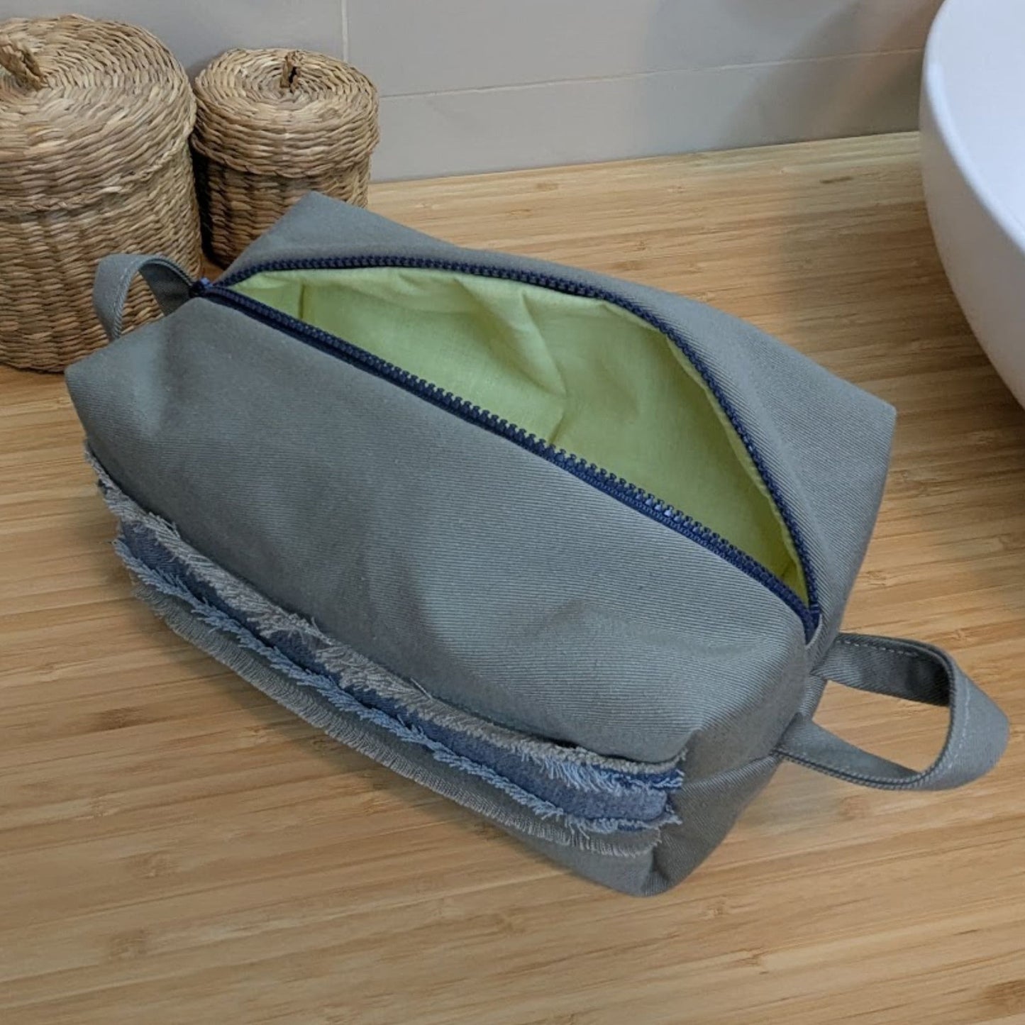 Large gray cosmetic bag made from upcycled jeans