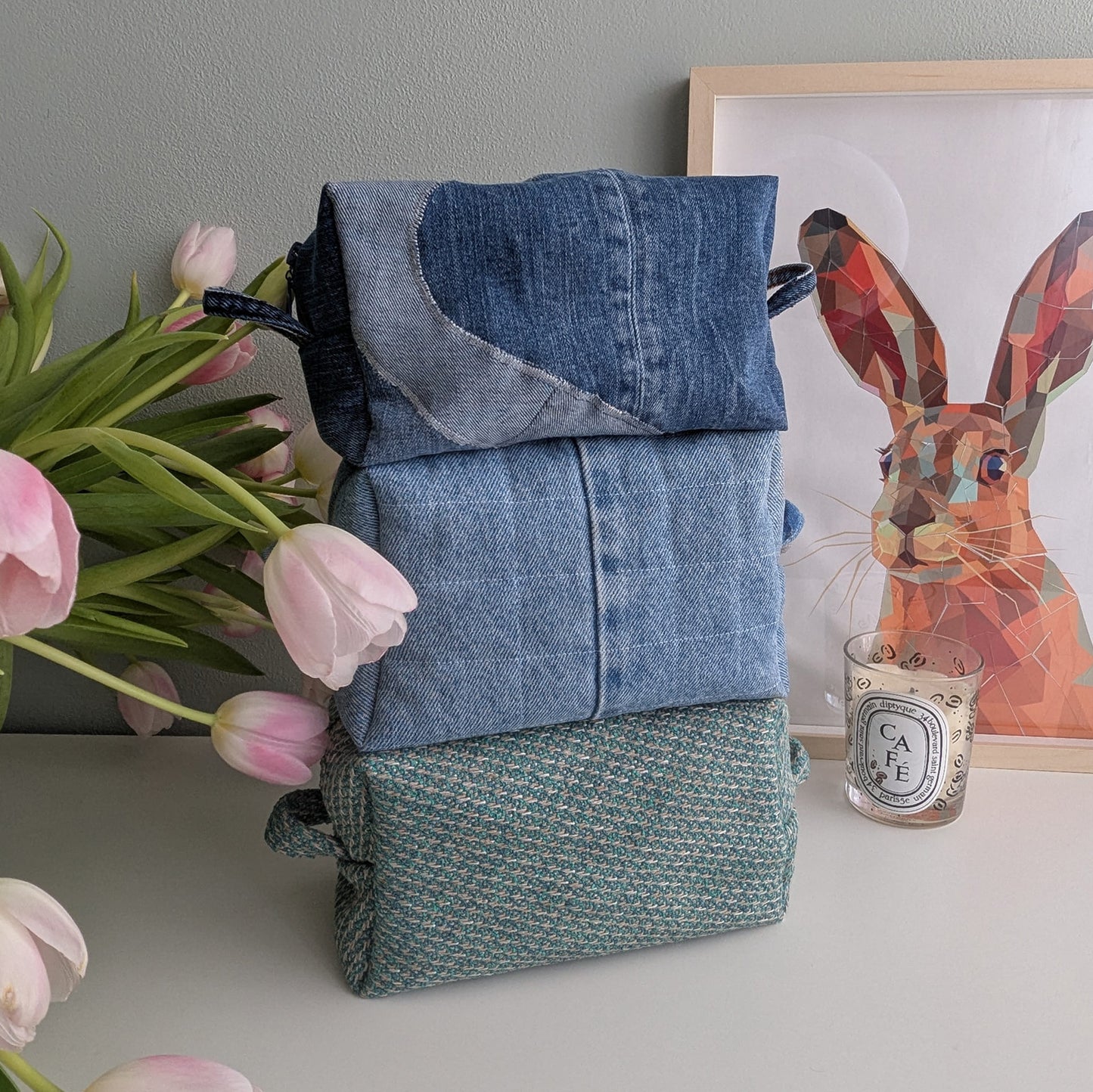 Large blue cosmetic bag made from upcycled jeans